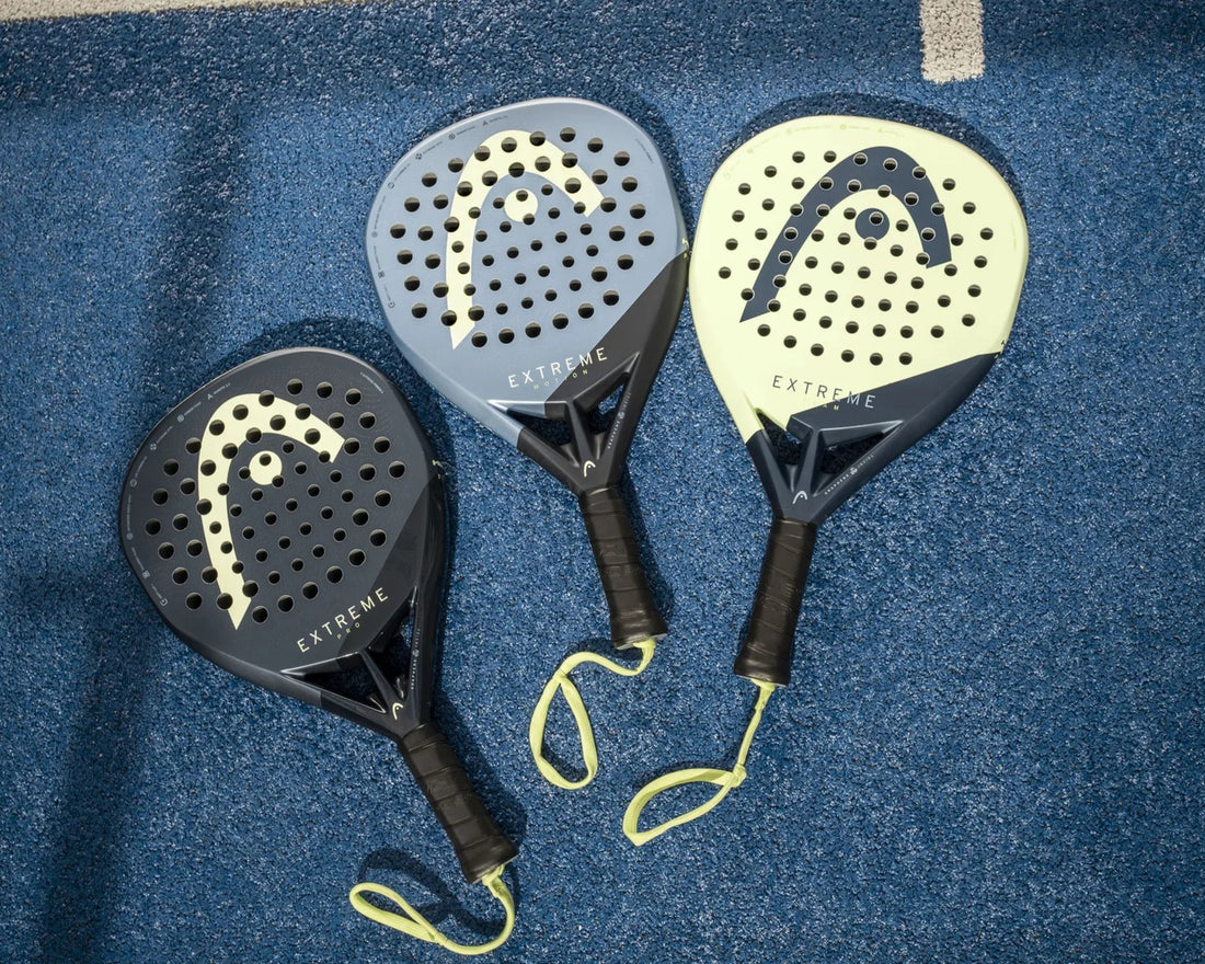 Three HEAD Extreme 2026 padel rackets (Pro, Motion, and Team models) on a blue padel court. Diamond-shaped rackets for power players. Expert guide to the new HEAD collection at Sport of Padel.